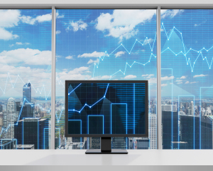 monitor with forex chart standing in office
